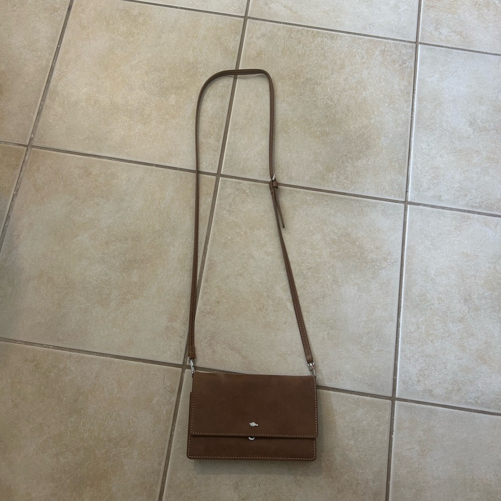 Roots crossbody clutch bag